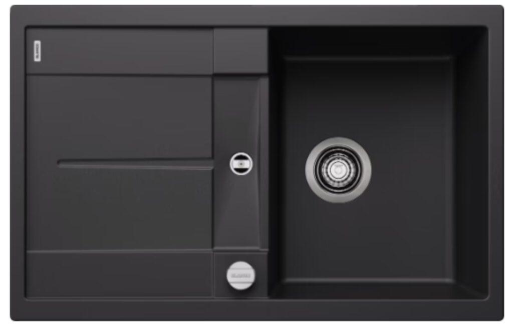 Modernes, rechteckiges Spülbecken mit Abtropfbereich, dunkler Farbton, glatte, matte Oberfläche.
